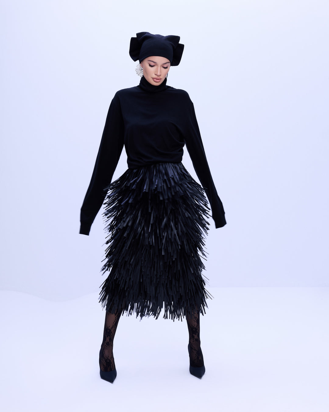Noir wool-viscose draped turtleneck sweater